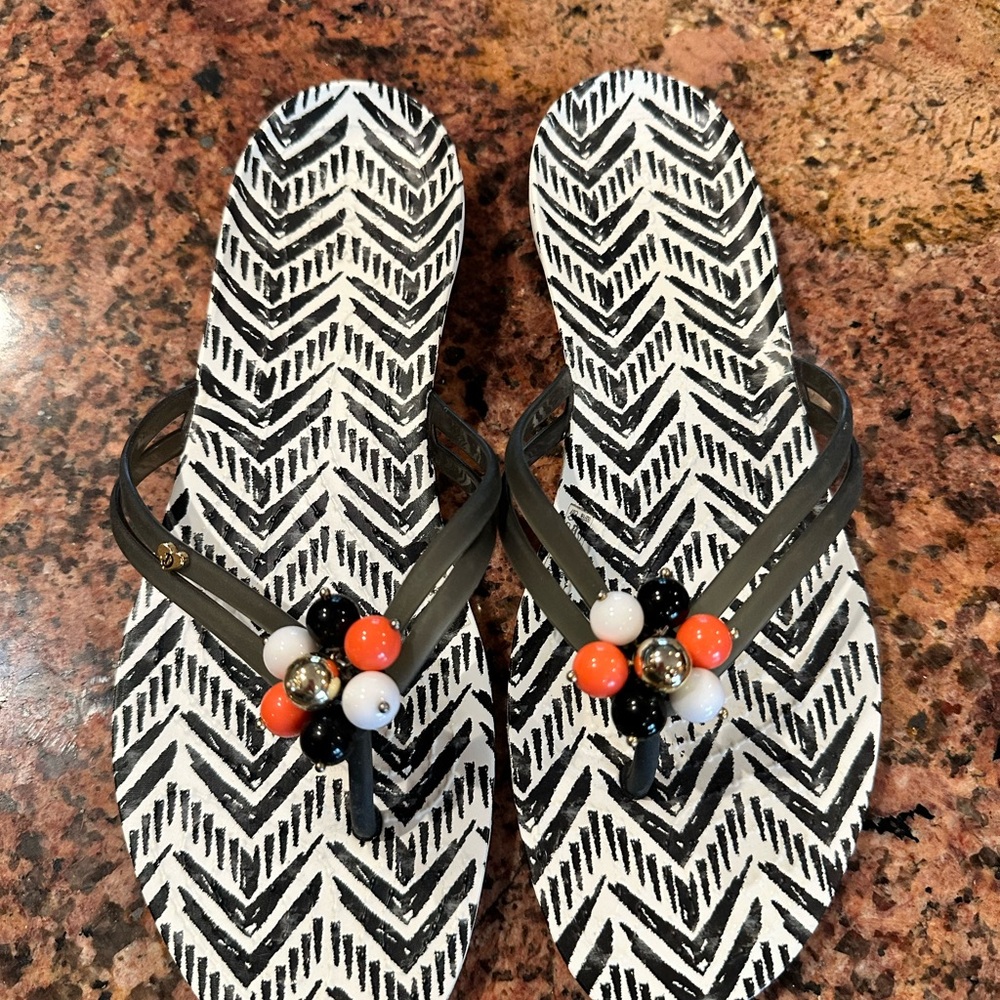 Stylish Black and White Sandals with Beaded Accents